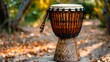 © Muhammad - A photo of a djembe with a strap