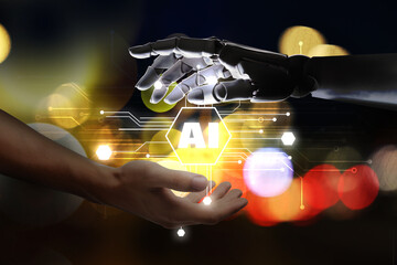 Poster - Artificial intelligence. Man and robot holding virtual AI chip with their hands on dark background, closeup
