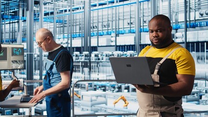 Poster - industry 4.0 industrial plant engineer automating robotic machines using ai technology. african amer