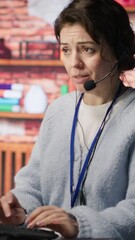 Poster - Vertical video Call center employee handling customer complaints, offering helpful solutions to their concerns. Customer service agent providing helpful information related to products or services