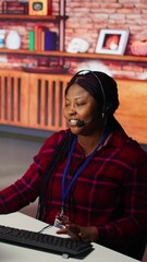 Poster - Vertical video Call center workers track shipments using artificial intelligence, looking at computer screen. Customer center agent uses software to locate clients packages and provide status updates