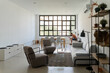 © Alba Vitta Studio/Stocksy - Modern Living Room Scene