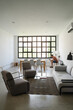 © Alba Vitta Studio/Stocksy - Modern Living Room Scene