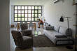 © Alba Vitta Studio/Stocksy - Modern Living Room Scene