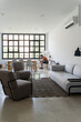 © Alba Vitta Studio/Stocksy - Modern Living Room Scene