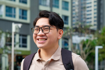 Happy young man in urban setting