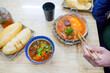 © Studio KME/Stocksy - Bánh Mì Chảo with Beef Stew and Baguettes