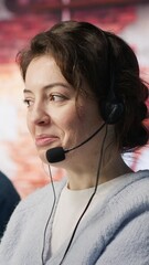 Poster - vertical video friendly customer support workers respond to customers inquiries about products or se