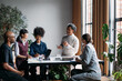 © Studio Firma/Stocksy - Relaxed business meeting
