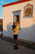 © Mauro Grigollo/Stocksy - Man and son during a walk in a town at sunset