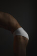 © Ivan Andrianov/Stocksy - Abstract Crop Male Body Part In Underwear