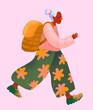 © Marusya Wrobel/Stocksy - An elderly woman is walking briskly against a pink background