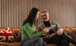 © VICTOR TORRES/Stocksy - Professional meeting with phone and British decor accents