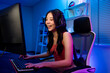 © Kawee - Asian beautiful esport woman gamer play online video game on computer.