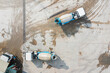 © Lawren Lu/Stocksy - Aerial View of Cement Plant and Mixer Trucks