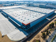 © ma yic/Stocksy - Aerial View of Warehouse Factory