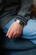 © Laura Stolfi/Stocksy - Man wearing electronic watch