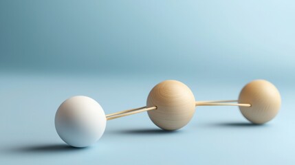 Poster - Three elegant wooden eggs arranged on a striking blue background representing client engagement journey mapping