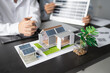 © Charlie's - Solar panels green energy Business man working green eco friendly office business creative idea Planing Bio economy for business eco friendly professional Engineer sustainable electricity.
