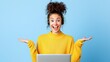 © Bantita - A cheerful woman in headphones expresses excitement while using a laptop against a light blue background.
