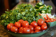 © Dejana - Fresh cilantro, tomatoes, onions, and peppers creating vibrant salsa ingredients