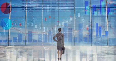 Poster - Image of statistics and financial data processing over businesswoman in office