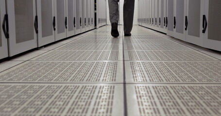 Poster - Image of businessman walking in server room