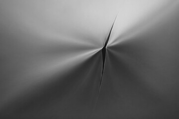 Poster - gray backdrop featuring a delicate tear, drawing attention with soft light effects radiating from th