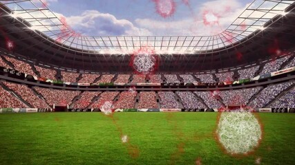 Poster - floating red particles over green field in empty stadium with animation