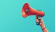 © Georgii - Hand holding a megaphone symbolizing communication and announcements