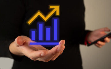 Poster - A woman is holding a cell phone and a blue and yellow graph. The graph is pointing upward, which could represent growth or progress. Concept of optimism and advancement
