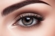 © serdon - The makeup is shown in close-up, featuring eyebrow makeup and eyelash extensions