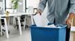 © Passion - Male disposing papers in office recycling bin