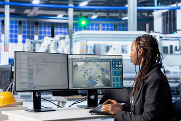 Poster - software developer typing code on pc in photovoltaics production facility, building software tools. 