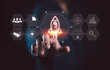 © Nirusmee - Startup business concept, Strategic planning and business success. Businessman touching rocket icon on virtual screen for fast start up business. business startup.
