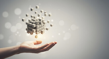 Poster - Hand Presenting Digital Block Cube Structure with Bokeh Light Abstract Design in White Background