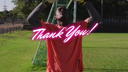 Poster - Holding ball, goalkeeper in orange jersey with animation of Thank You! text