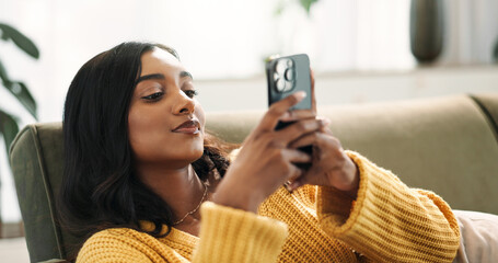 Aufkleber - Woman, relax and phone for online shopping on sofa by browsing, website and social media in living room. Smile, female person and surfing internet, networking and chat notification on couch at house