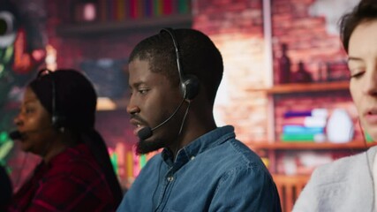 Poster - call center staff members wearing headphones assisting customers in office. woman at work next to af