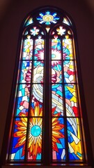 Fototapete - Vibrant Sunlight Filtering Through Colorful Stained Glass Windows Creating a Stunning Spectrum of Colorful Reflections and Patterns in a Church Interior