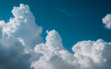 Aufkleber - Hint: The image shows a bright day with fluffy clouds. The sky is blue.

Fluffy white clouds drift across a vast blue sky on a bright day. The sunlight bathes the clouds in soft light, creating a sere
