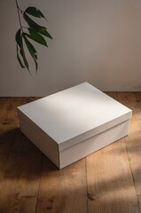 Poster - elegant white storage box on wooden floor with soft natural light illuminating the scene in a cozy i