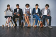 © peopleimages.com - Technology, search or business people waiting for hiring app, recruitment or job interview in office. Sign up, phone or candidates on tablet in corporate for employment opportunity or registration