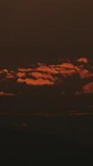 Wall Mural - Sun Sunrise Above Mountains Time-lapse. Amazing Bold Golden Sunrise Gradient Sky Background. Natural Bright Dramatic Sky. Warm Yellow And Orange Colors. Sun Above Hills
