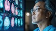 © เลิศลักษณ์ ทิพชัย - A Doctor Analyzing Brain Scans: A focused medical professional examines detailed brain scans, their gaze fixed on the intricate data.