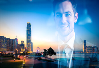 Aufkleber - Double exposure showcases a smiling businessman superimposed over a vibrant Hong Kong cityscape at dusk.  Modern buildings and city lights blend seamlessly.