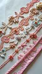 Poster - A row of flowery lace with pink and white flowers. The lace is made of beads and is very pretty