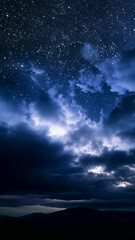Poster - A stormy sky with clouds and a bright light. The sky is dark and cloudy