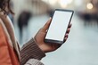 © Meenaxi - Woman Holding Smartphone Blank Screen Modern Technology Device App Hand City Urban Style Mobile