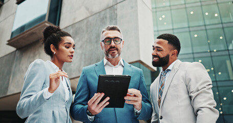 Poster - Finance, colleagues and business people in city with tablet, news or review for feedback, project or sales. Account manager, teamwork or employees with tech for collaboration, low angle or discussion